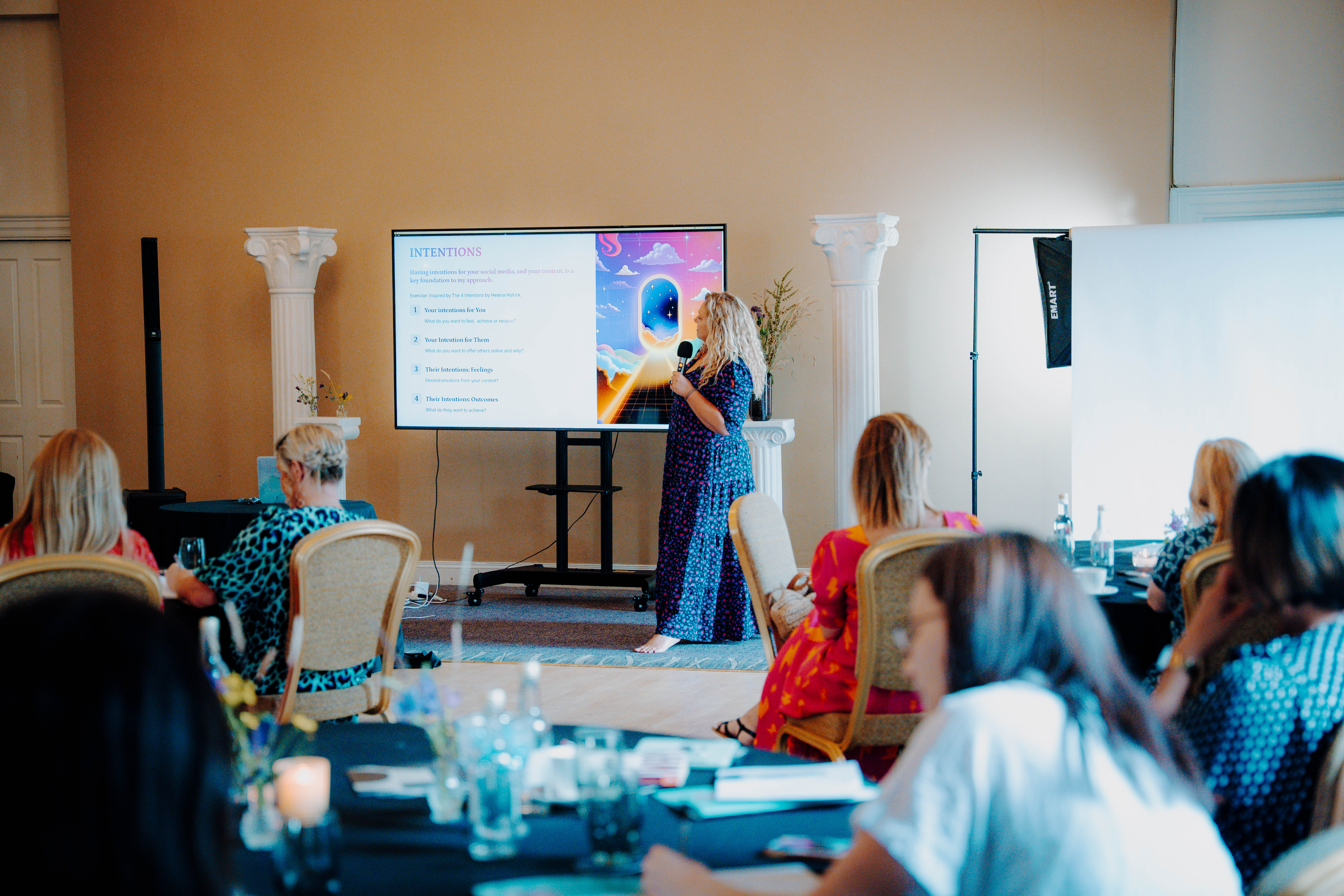 A room of participants during a session